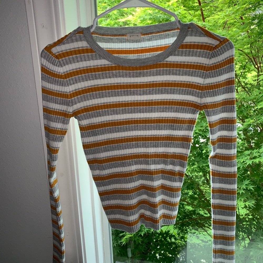 Striped tight fitting long sleeve.
